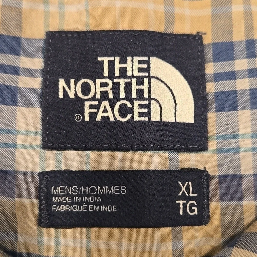 THE NORTH FACE SHORT SLEEVE PLAID BUTTON UP SHIRT. SIZE X- LARGE. BLUE/ TAN.